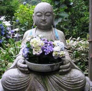 The statue of a young Buddha is the main symbol of Hana Matsuri